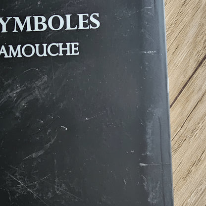 Extrait du livre Paroles De Symboles par Noureddine Hamouche avec un symbole et sa définition - sur Azamoul mode et accessoires berbères amazigh. Une page qui représente un symbole qui peut être utilisé dans les tatouages berbères
