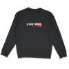 femme qui porte un pull thilelli liberte 100% coton bio, écrit en langue tifinagh, la langue des berbères amazigh par Azamoul mode et accessoires berbères,  de couleur noir