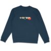 femme qui porte un pull thilelli liberte 100% coton bio, écrit en langue tifinagh, la langue des berbères amazigh par Azamoul mode et accessoires berbères,  de couleur bleu