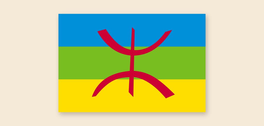 Drapeau amazigh bleu, vert et jaune avec le Yaz ⵣ rouge au centre